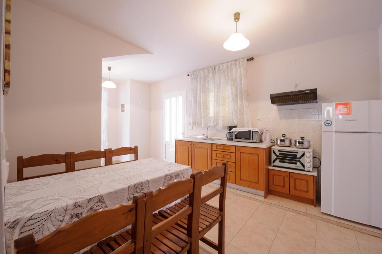 Elias & Vasili House Hotel Agios Georgios Pagon Bagian luar foto